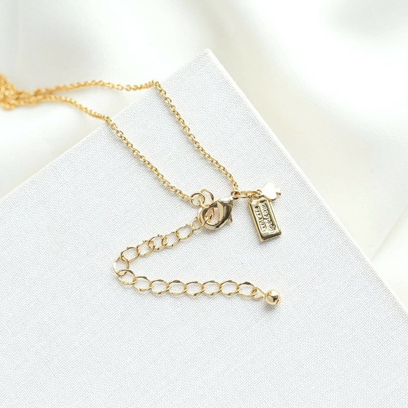 Kate Spade Cold Comfort Polar Bear Charm Necklace - Picture 4 of 8